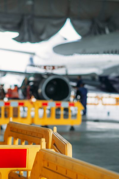 Aircraft engine maintenance in hangar, repairing