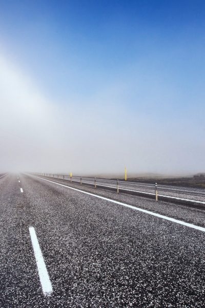 Asphalt road to the mountains Iceland. Beauty world